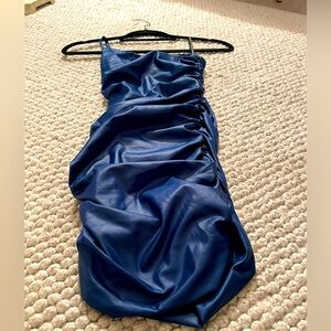 It’s a cute Katie J NYC navy blue dress. Size 9-12